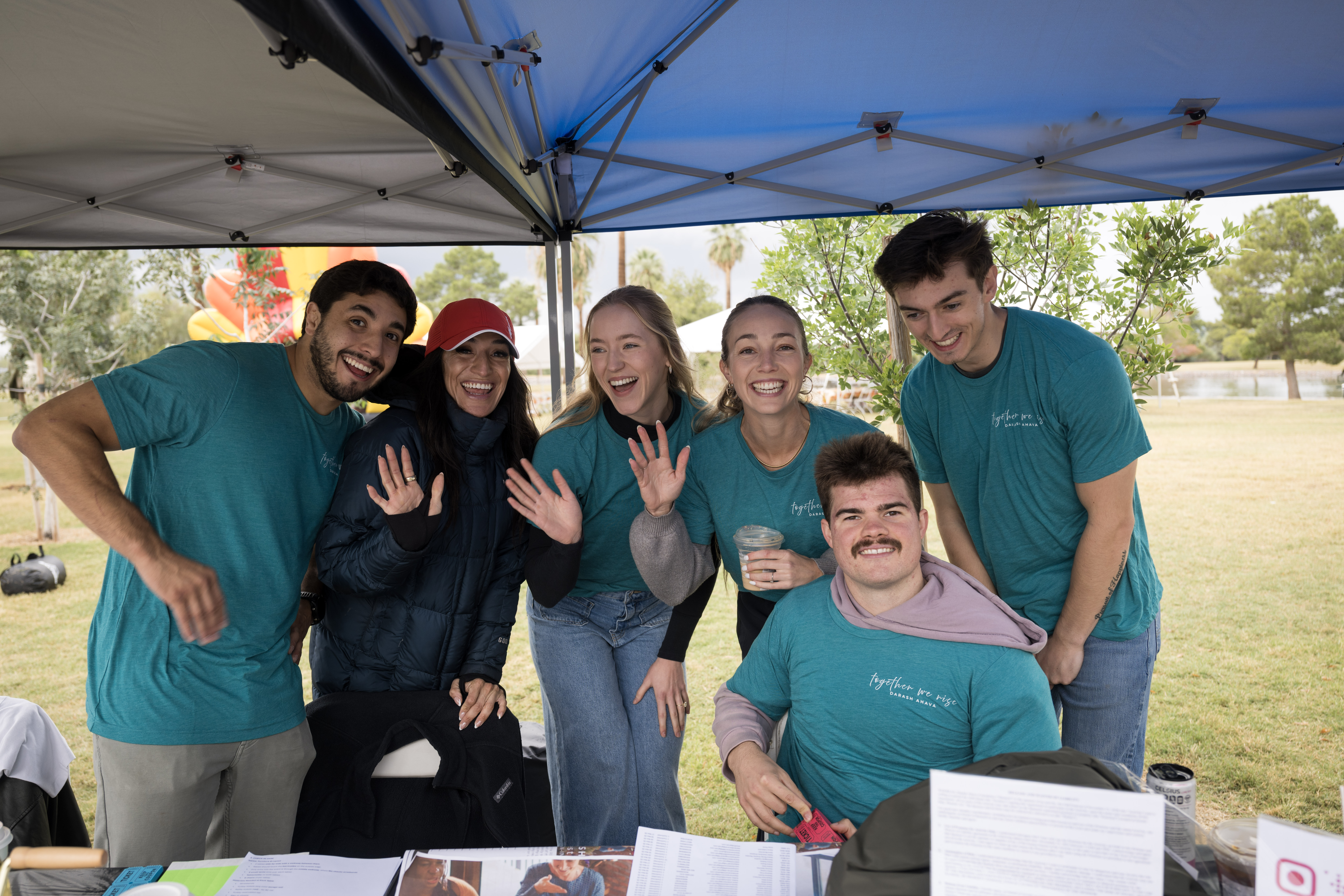 Fall Festival volunteers in blue shirts